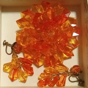 Beautiful orange brooch and clip on earrings